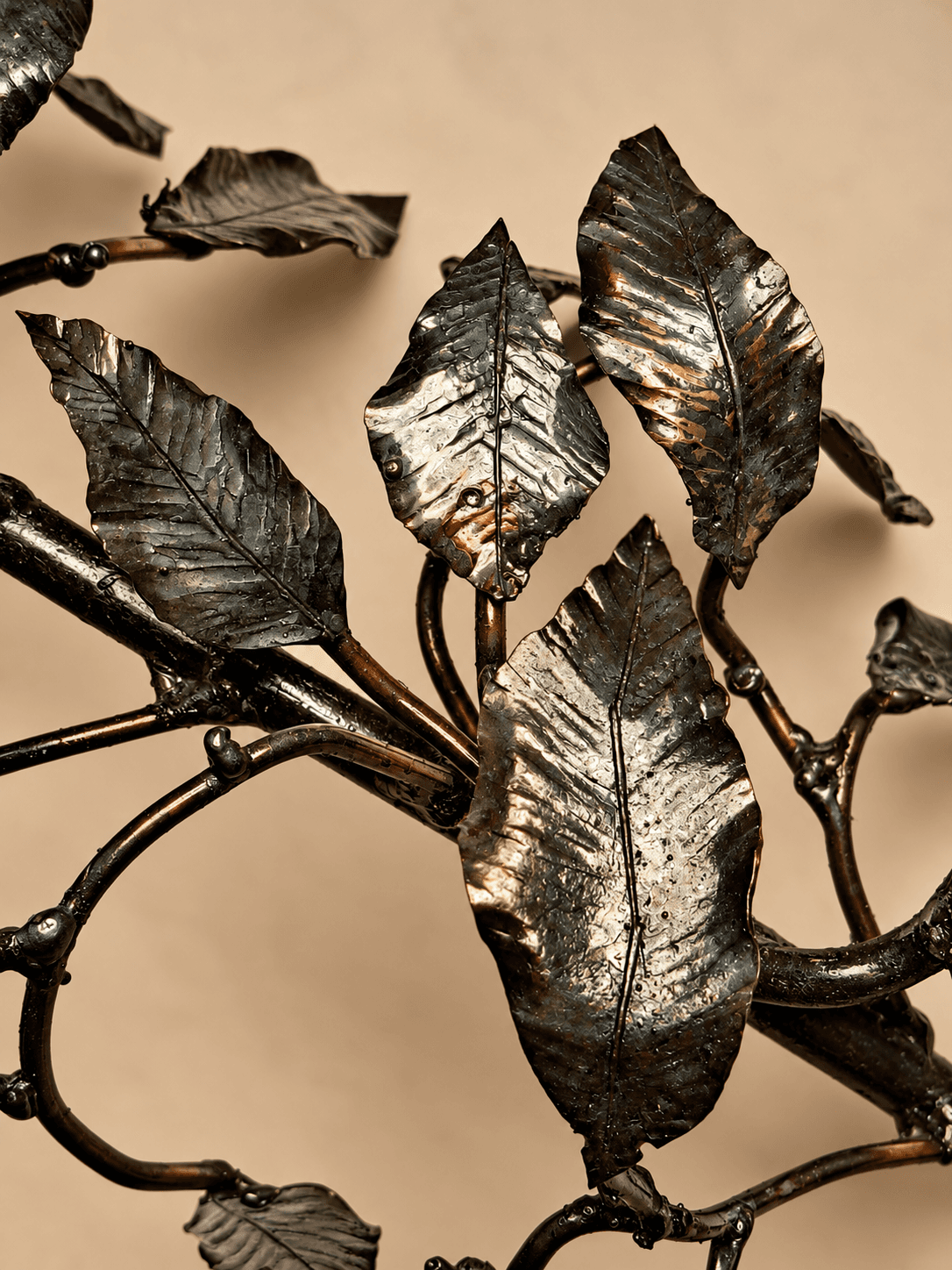 Close-up of individually hand-forged iron leaves